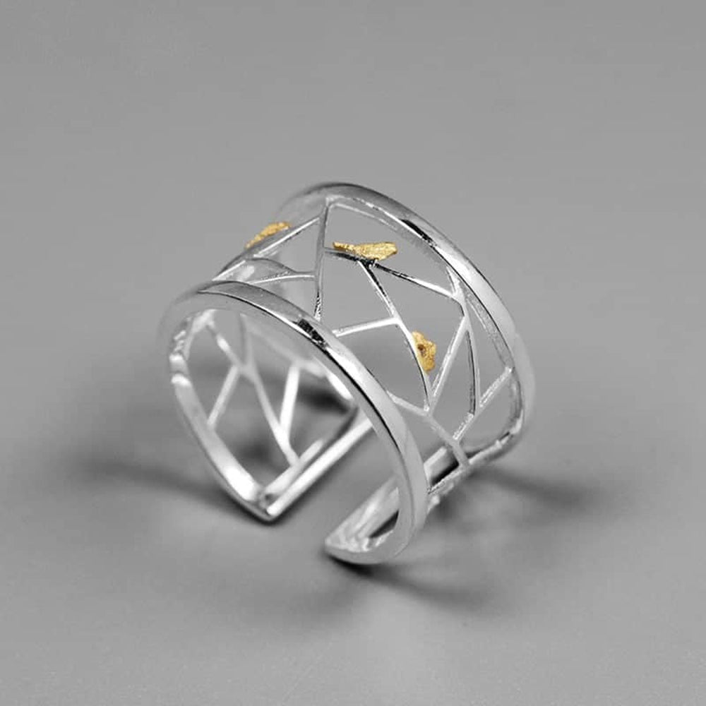 
                      
                        Ring-With-A-Grid-And-A-Small-Bird-By-Yonandole_2
                      
                    