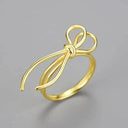 Ring-With-A-Loose-Knot-By-Yonandole_2