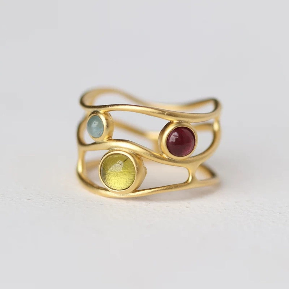 
                      
                        Ring-With-Gemstone-Dots-Gaudi-Style-By-Yonandole_1
                      
                    