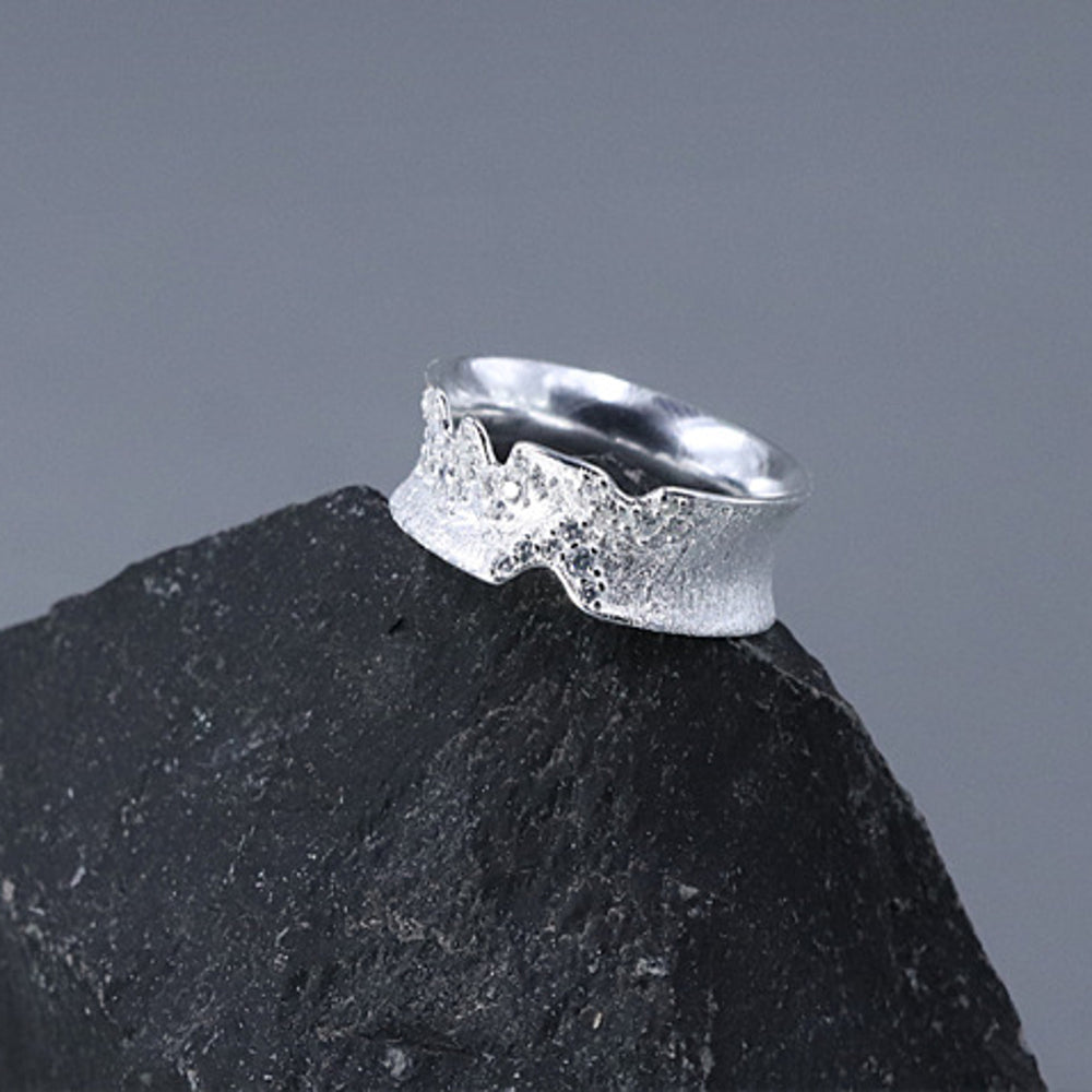 
                      
                        Ring-With-Uneven-Edges-And-Cubic-Zirconia_7
                      
                    