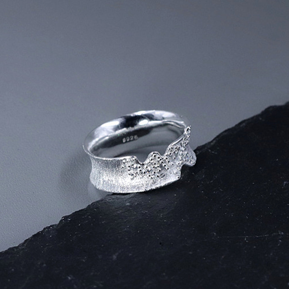 
                      
                        Ring-With-Uneven-Edges-And-Cubic-Zirconia_8
                      
                    