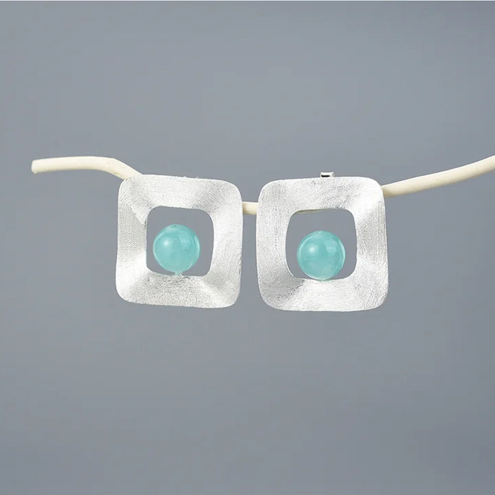 
                      
                        Square-Uneven-Earrings-With-Gemstone-By-Yonandole_15
                      
                    