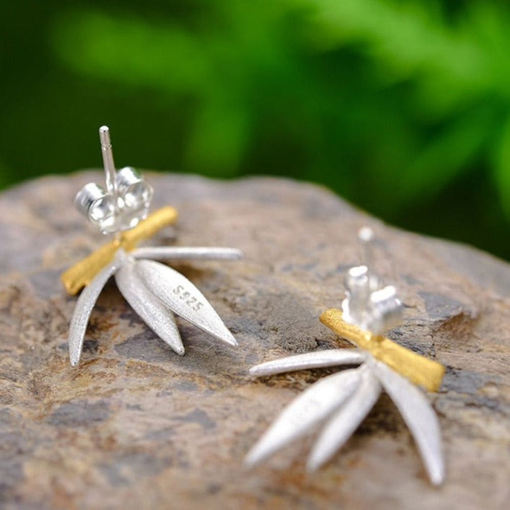 
                      
                        Stud-Earrings-With-Bamboo-Leaves-By-Yonandole_3
                      
                    