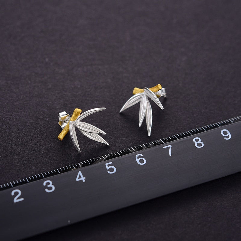 
                      
                        Stud-Earrings-With-Bamboo-Leaves-By-Yonandole_6
                      
                    