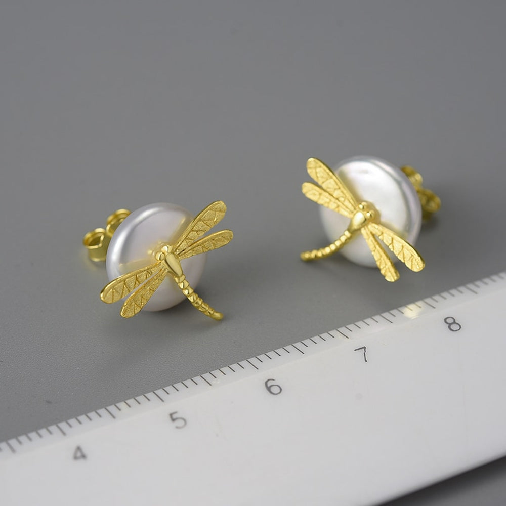 
                      
                        Stud-Earrings-With-Baroque-Pearl-And-Dragonfly-By-Yonandole_5
                      
                    