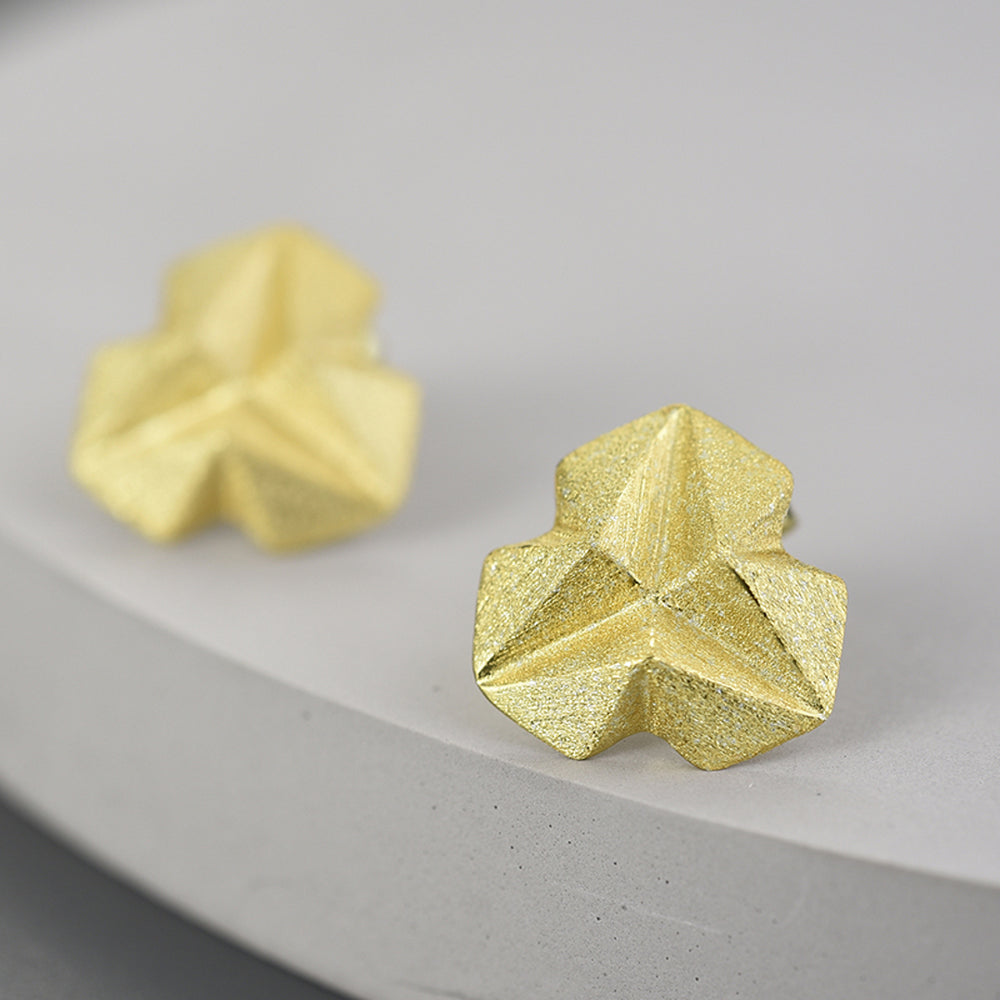 
                  
                    Stud-Earrings-With-Stereoscopic-Triangle-By-Yonandole_3
                  
                