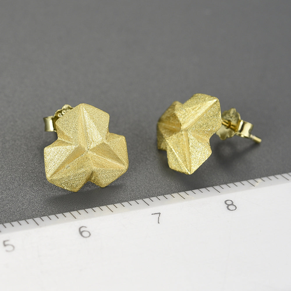 
                  
                    Stud-Earrings-With-Stereoscopic-Triangle-By-Yonandole_4
                  
                