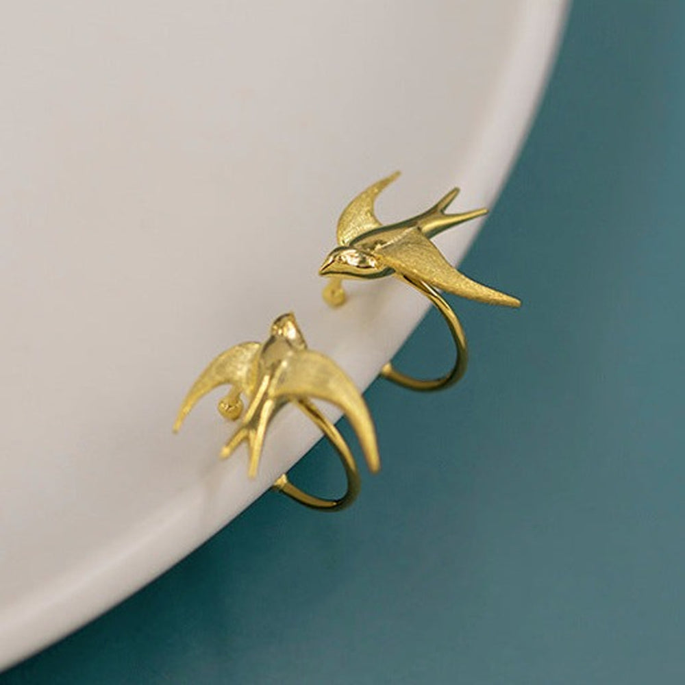 
                      
                        Trendy-Ear-Cuff-Earrings-With-Bird-By-Yonandole_4
                      
                    