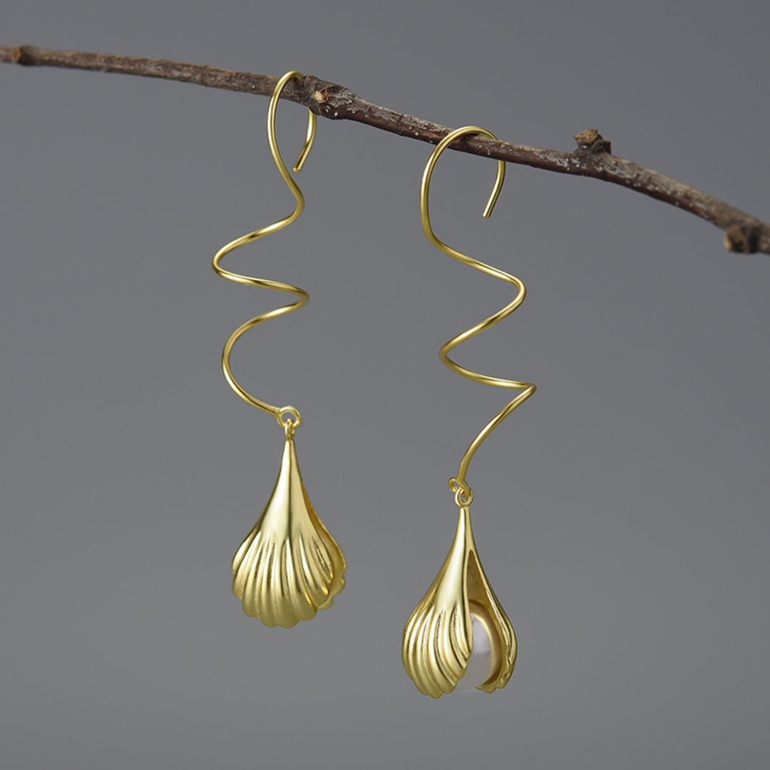 Wire-Earrings-With-Mother-Of-Pearl-Bead-In-A-Shell-Setting-By-Yonandole_5