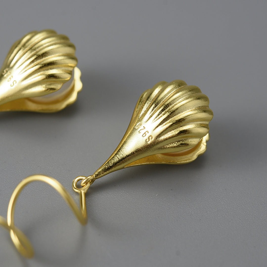 Wire-Earrings-With-Mother-Of-Pearl-Bead-In-A-Shell-Setting-By-Yonandole_7
