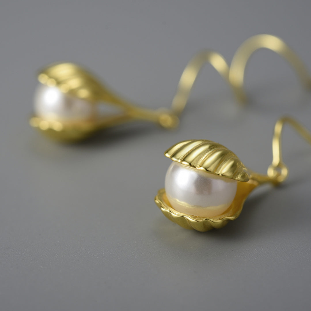 Wire-Earrings-With-Mother-Of-Pearl-Bead-In-A-Shell-Setting-By-Yonandole_8