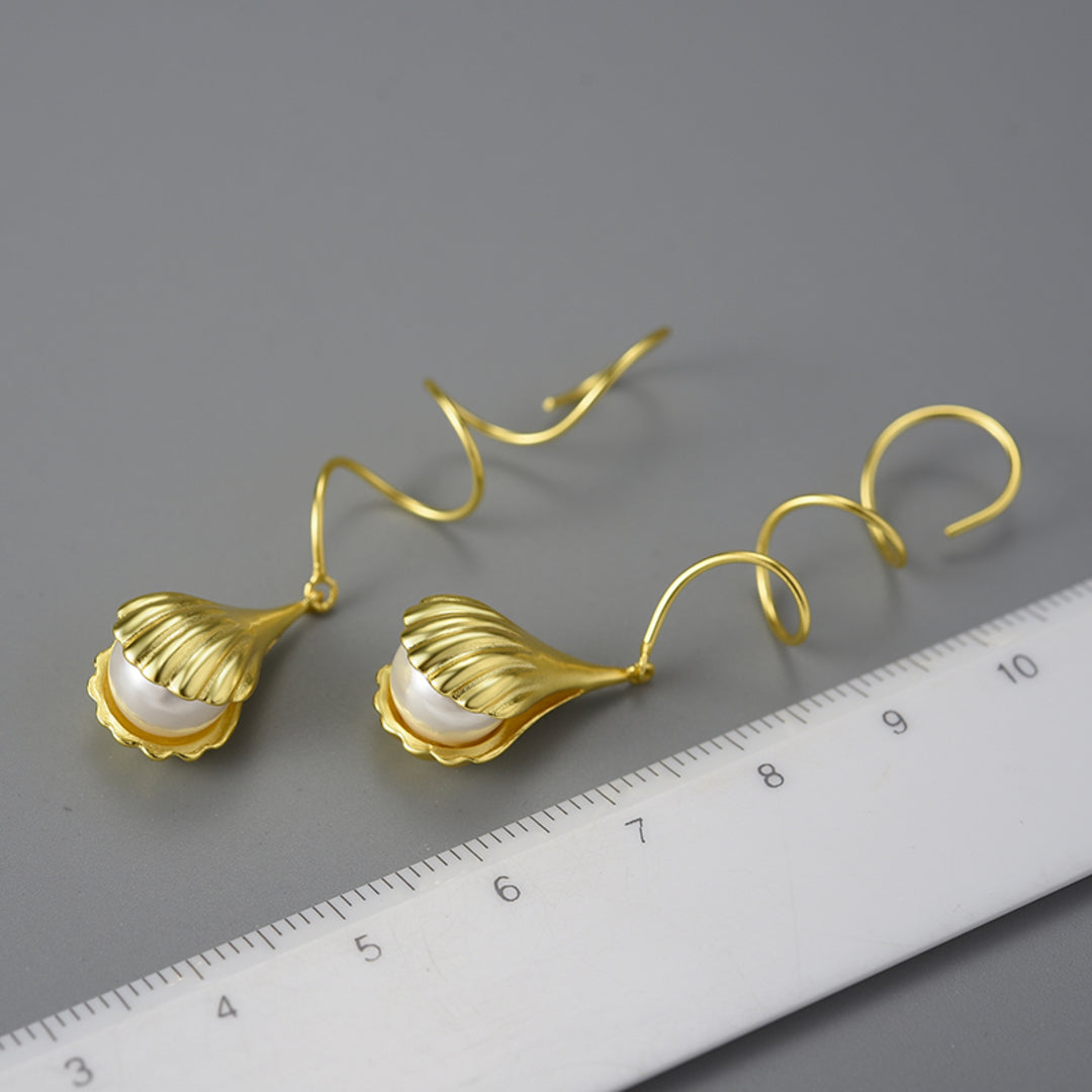 Wire-Earrings-With-Mother-Of-Pearl-Bead-In-A-Shell-Setting-By-Yonandole_9